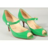 A PAIR OF CHRISTIAN LOUBOUTAIN GREEN PATENT OPEN TOE SHOES Size 37.5.