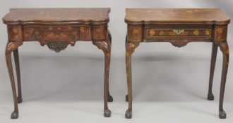 A NEAR PAIR OF 18TH CENTURY DUTCH MARQUETRY FOLDING TOP CARD TABLES inlaid with flowers, birds and