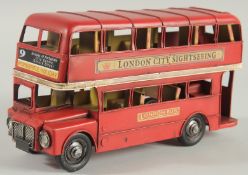 A RED TIN PLATE LONDON BUS. 10ins long.