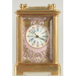 A MINIATURE SEVRES DESIGN CARRIAGE CLOCK. 2.5ins .