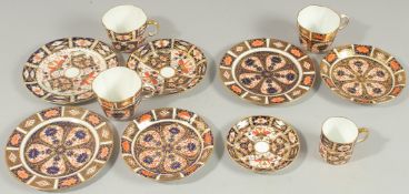 ROYAL CROWN DERBY Pattern 1128: 2 coffee cups, saucers, side plates, a coffee cup, saucer and side