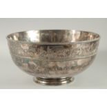 THE EQUESTRIAN CIRCULAR SILVER PLATED PUNCH BOWL. 38/1500, the side with a band of horses. 13.5ins