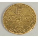 A 1701 GOLD GUINEA.