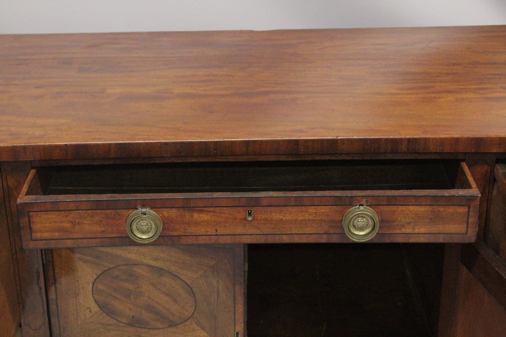 A GOOD GEORGE III MAHOGANY STRAIGHT FRONTED SIDEBOARD with plain legs and ovals to the front, with - Image 4 of 6