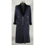 A CHANEL NAVY BLUE TWO PIECE SKIRT SUIT. Size 42 with velvet trim to jacket and gilt Chanel