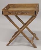 A MOET & CHANDON WOODEN BUTLERS TRAY on a stand.