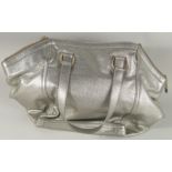 A GOOD YVES ST. LAURENT SILVER / METALLIC LEATHER BAG. 18ins long overall, 12ins high.