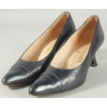 A PAIR OF CHANEL NAVY LEATHER SHOES. SIZE 38.