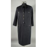 A CHANEL NAVY BLUE WOOL DRESS with Chanel four leaf clover buttons. Size label removed approx. size,