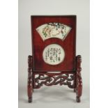 A MINIATURE CHINESE TABLE SCREEN with painted panels.