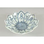 A CHINESE BLUE AND WHITE PORCELAIN PETAL SHAPE BOWL, with lucky symbol. 17.5cm diameter