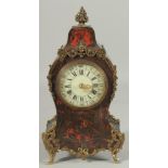 A 19TH CENTURY BOULLE CLOCK 12ins high.