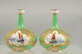 A PAIR OF ROYAL CROWN DERBY VASES painted with sailing vessels by W.E.J. DEAN. Initialled.