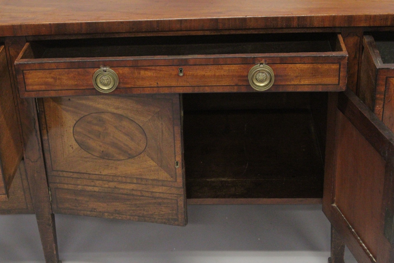 A GOOD GEORGE III MAHOGANY STRAIGHT FRONTED SIDEBOARD with plain legs and ovals to the front, with - Image 5 of 6