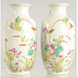 A SMALL PAIR OF CHINESE REPUBLIC VASES painted with flowers. 4.5ins high.