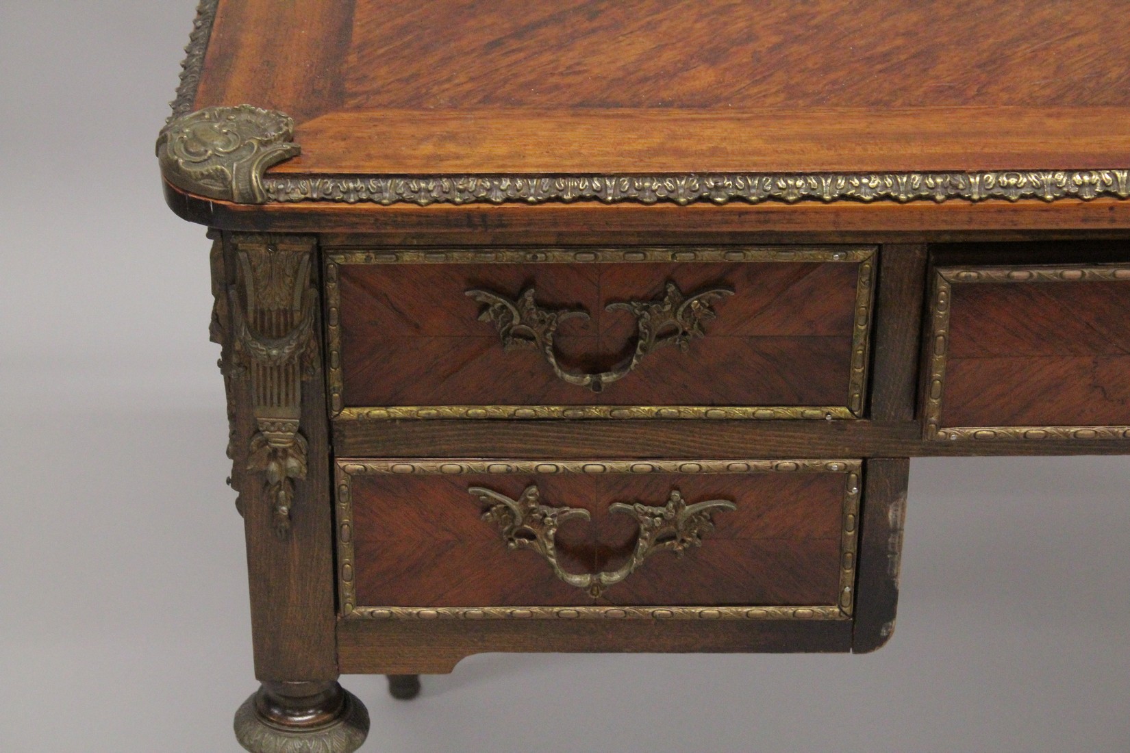 A LOUIS XVITH DESIGN WRITING TABLE with wooden top, five drawers on turned legs with ormolu - Image 2 of 7