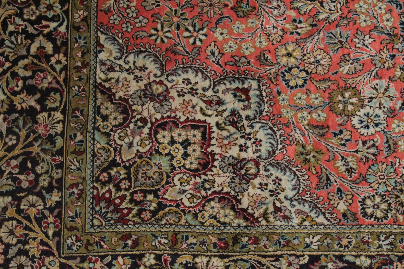 A PERSIAN PART SILK CARPET pink ground with sylised floral decoration within a similarly border. - Image 2 of 4