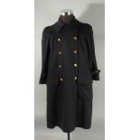 A CHANEL NAVY WOOL COAT with Chanel gilt buttons, three quarter length sleeves, silk lining. Size UK