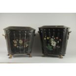 A PAIR OF TOLEWARE COAL BUCKETS AND COVERS painted with flowers. 16ins high.