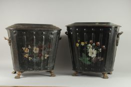 A PAIR OF TOLEWARE COAL BUCKETS AND COVERS painted with flowers. 16ins high.