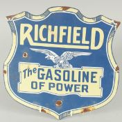 A SHAPED ENAMEL SIGN 'RICHFIELD, THE GASOLINE OF POWER' 12ins wide.