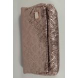 A LOUIS VUITTON FOLDING SILVER METALLIC CLUTCH BAG with folding front. 12ins long, 7ins deep, in