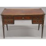A LOUIS XVITH DESIGN WRITING TABLE with wooden top, five drawers on turned legs with ormolu