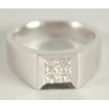 A HEAVY 18CT WHITE GOLD, HALLLMARKED TABLET RING. Diamonds approx. 0.5 carat.