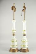 A PAIR OF BOHEMIAN GLASS LAMPS on circular bases. 35ins overall.