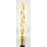 A WALKING STICK WITH CARVED BONE HANDLE ' Nude'.