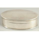 A PLAIN SILVER OVAL SNUFF BOX