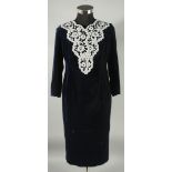 A CATHERINE WALKER NAVY VELVET DRESS with pearl design, silk lining, small tear to back seam.