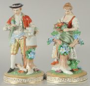 A PAIR OF SITZENDORF PORCELAIN FIGURES of a man with a watering can and a young lady with a basket