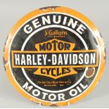 A CIRCULAR ENAMEL SIGN 'HARLEY DAVIDSON' 11.5ins diameter.