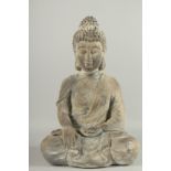 A SEATED BUDDHA. 21ins high.