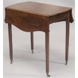 A GEORGE III MAHOGANY BUTTERFLY PEMBROOKE TABLE with shaped folding flap, end drawer on tapering