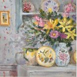 Modern British School, A still life of flowers in a vase on a cupboard and other objects on a shelf,
