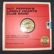 [BEATLES INTEREST] SOUTHALL (Brian) Sgt. Pepper's Lonely Hearts Club Band, Carlton Books, Signed (by