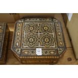 An Eastern inlaid wooden box.