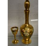 A Venetian glass decanter and a small goblet.