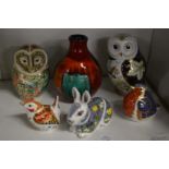 A small collection of Royal Doulton animals and birds together with a Poole pottery vase.