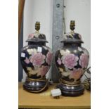 A pair of pottery table lamps.