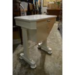 A white painted work table.
