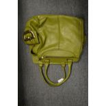A Jaeger green leather handbag.