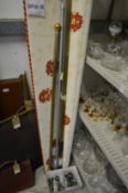 A large roller blind and valance and other curtain poles with accessories.
