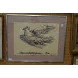 A Picasso print of a dove.