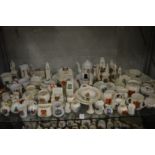 A large collection of crested china.