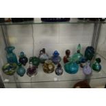A good collection of Mdina and similar glassware.