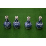 A set of four miniature Chinese blue and white vases.