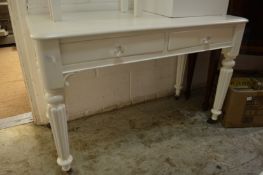 A white painted two drawer side table.